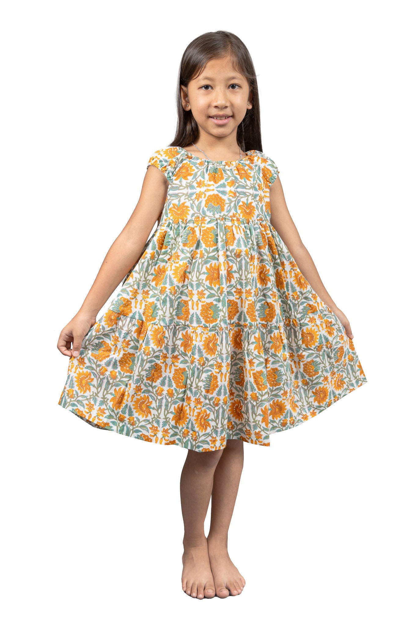 Introducing our delightful flower print dress for girls! Made from 100% cotton, this dress is the perfect choice for a stylish and comfortable summer. Its vibrant floral pattern adds a touch of charm, while the breathable fabric ensures a cool and airy feel. Ideal for any sunny adventure!